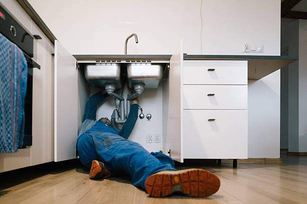 Professional Drain Cleaning technician working in Niantic, IL